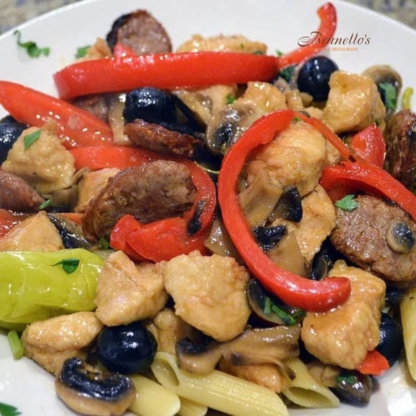 Brunello's Italian pasta dish with chicken, sausage, red peppers, mushrooms, and olives.