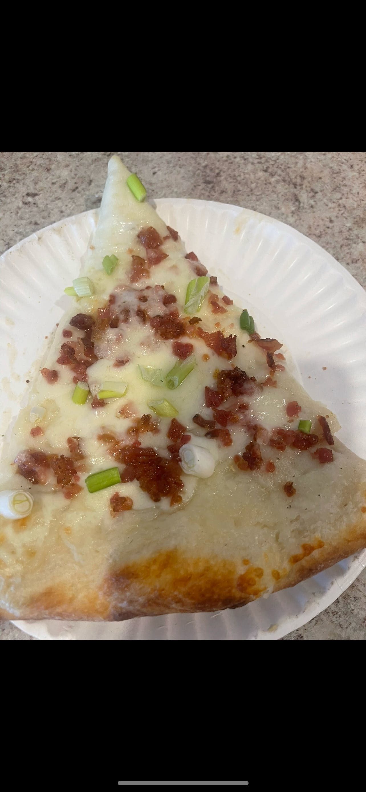 Loaded Baked Potato Pizza Slice.