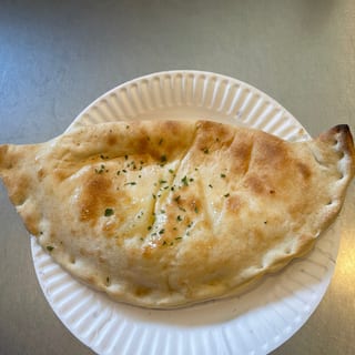 Quattro Formaggi Calzone