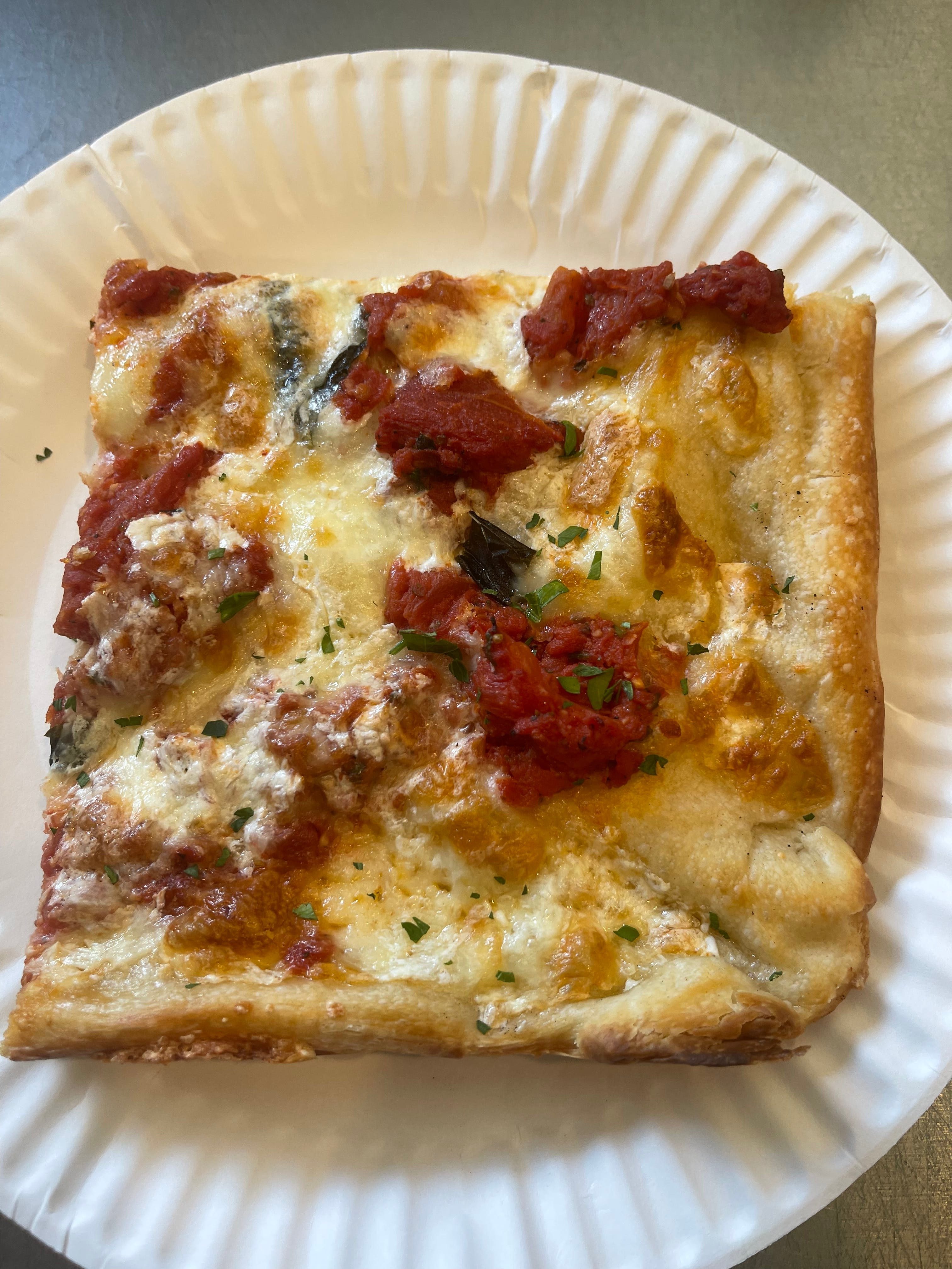 Nonna Grandma Pizza Slice.